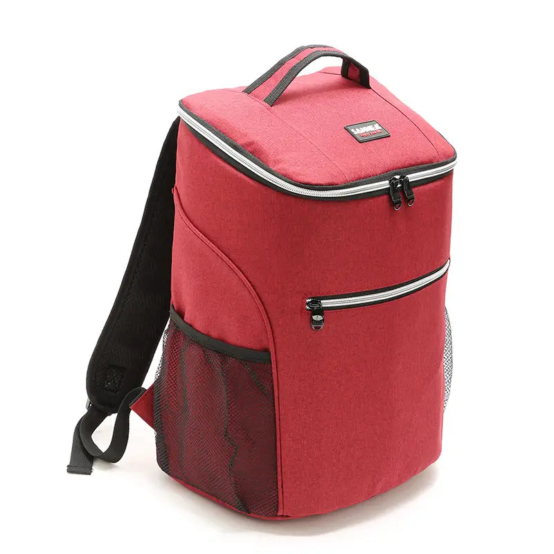 Red insulated cooler backpack made of waterproof oxford fabric with black zippers and mesh side pockets for picnic use