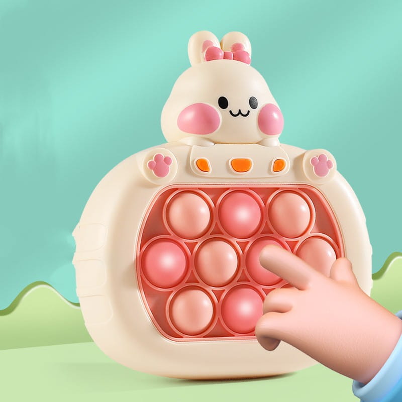 Cute cream-colored bunny-shaped pop-it fidget toy with pink cheeks ears and buttons designed as part of the Quick Push Game Console duck and bunny fidget toy collection.