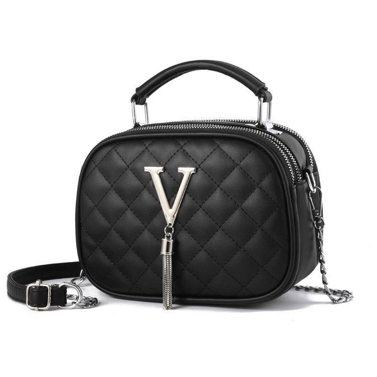 Black quilted handbag with silver v logo hardware and chain strap perfect for elegant occasions