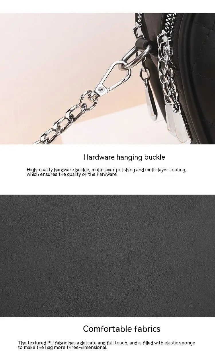 Quilted handbag in black textured pu fabric with silver-toned metal chain strap and hardware buckle.