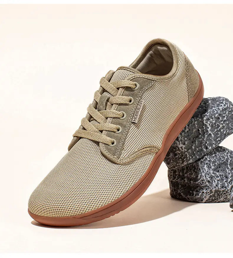 Chaussures de sport décontractées en daim unisexes gs6968 avec dessus en daim et en maille beige, semelle en caoutchouc couleur caramel.