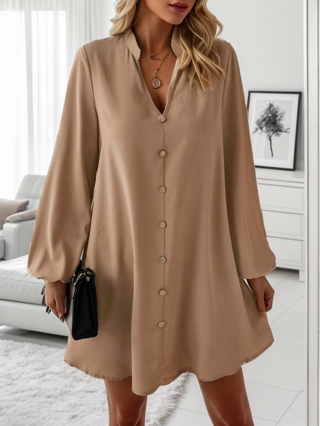 Beige bell sleeve button down midi dress with long sleeves v-neckline and flowing silhouette.