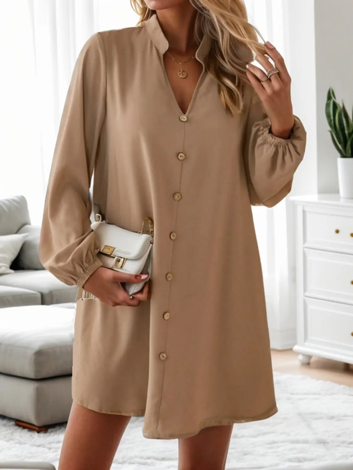 Beige bell sleeve button down midi dress with a relaxed fit and elastic cuffs in long sleeve design.