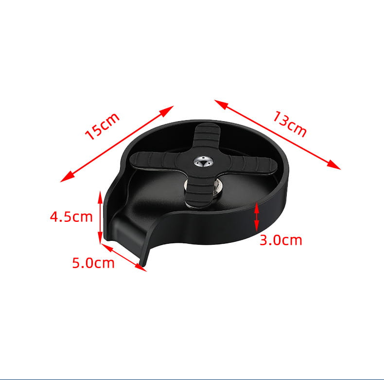 Black plastic cup washer for kitchen sink with central cross-shaped grip and integrated drainage channel for automatic glass rinsing.