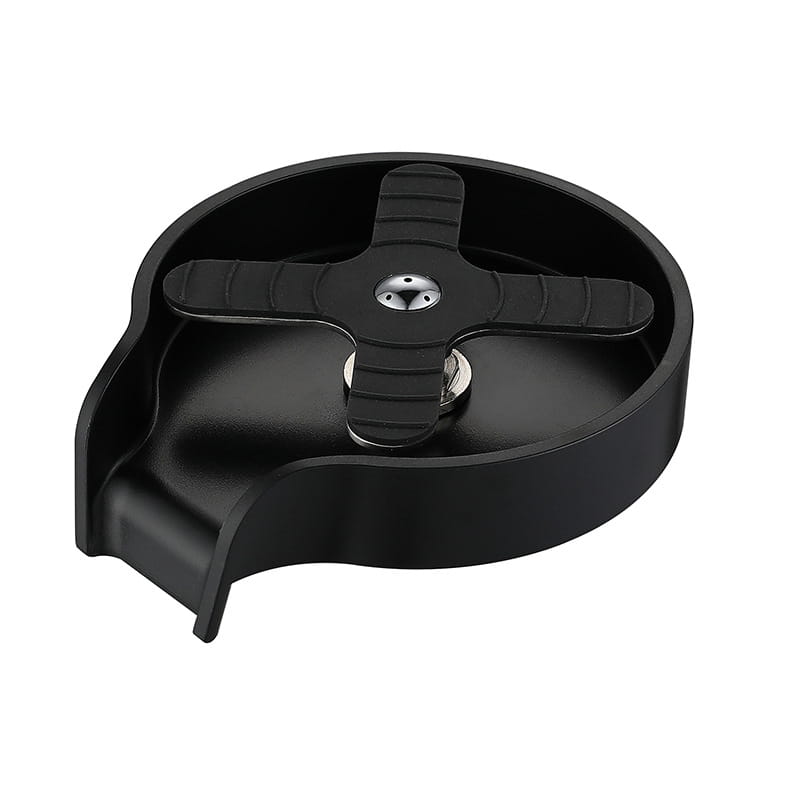 Black plastic cup washer for kitchen sink automatic glass rinser with a central cross-shaped handle and metallic screw accents.