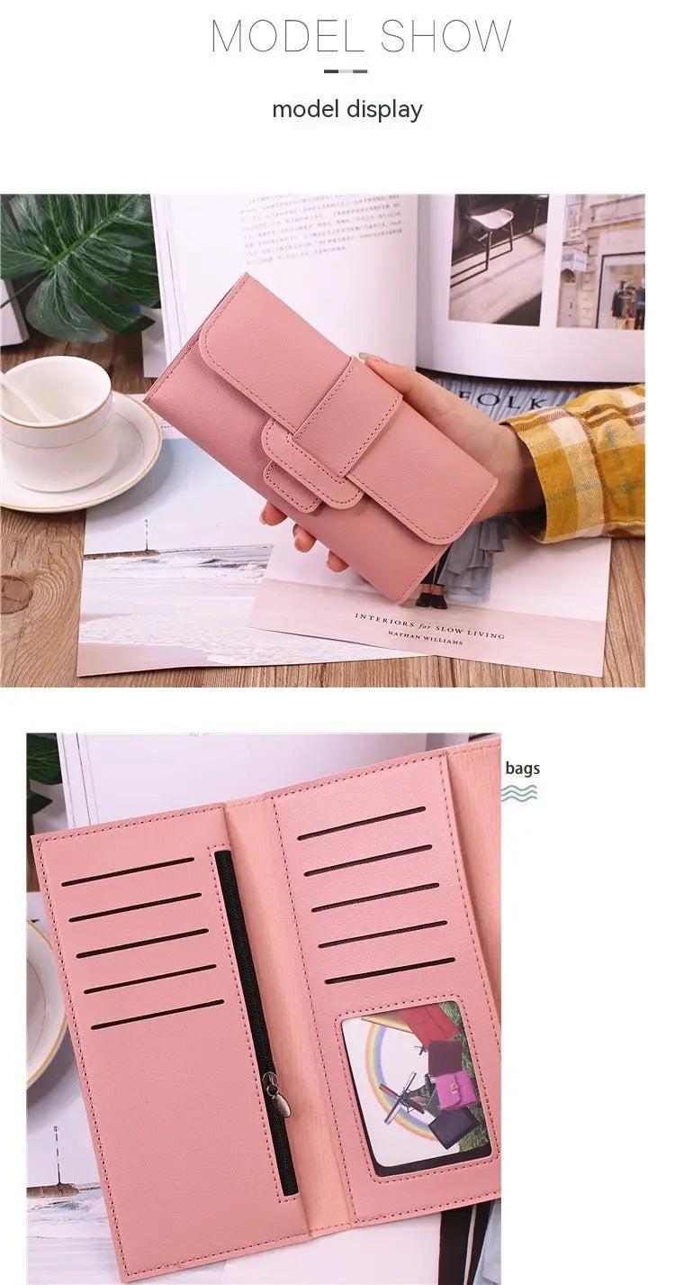 A soft pink tri-fold leather clutch wallet with flap closure and multiple card slots for women.