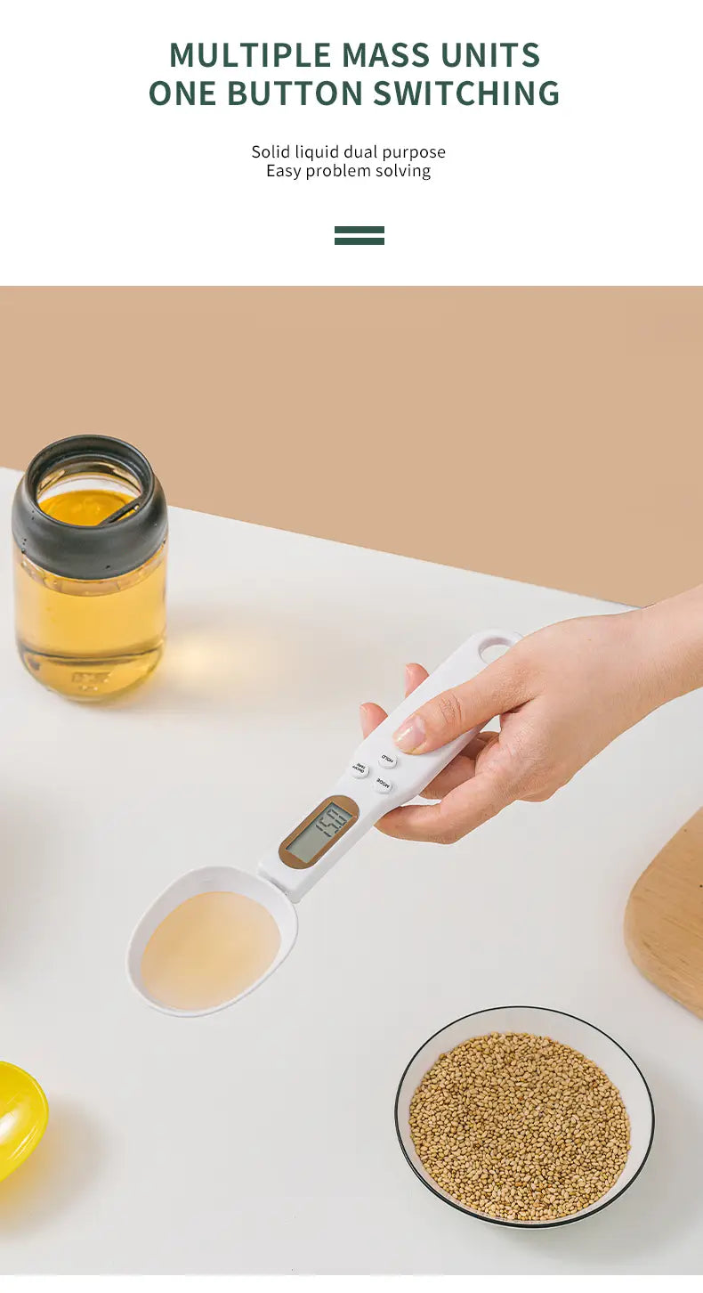 white digital spoon scale with a small lcd screen and buttons for switching between multiple mass units designed for precise measuring up to 500g