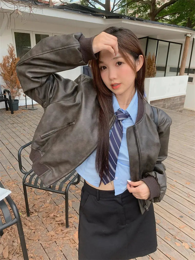 dark brown faux leather bomber jacket with ribbed cuffs and collar in retro biker style