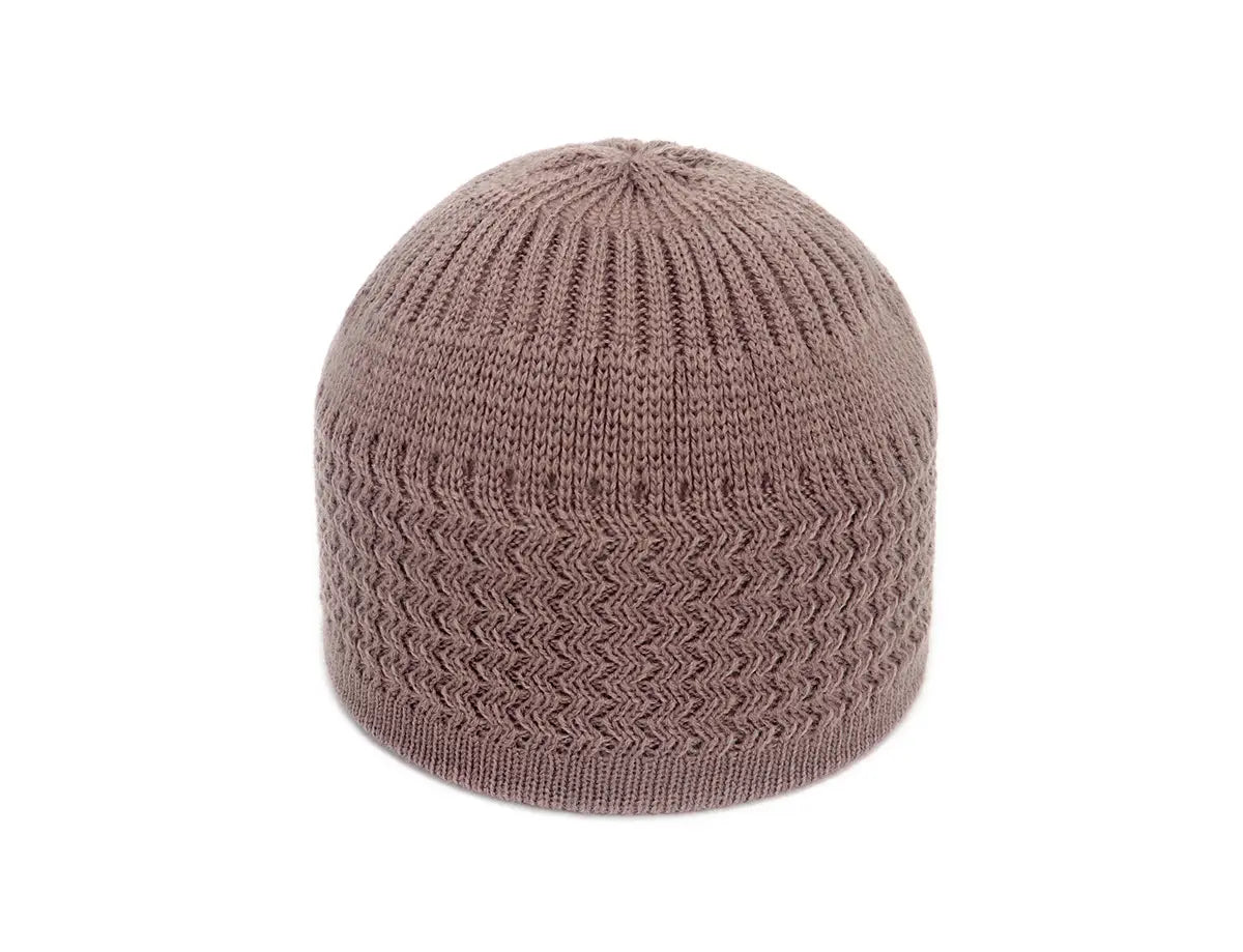 A taupe knitted jacquard winter beanie hat featuring a ribbed top and chevron-patterned body.
