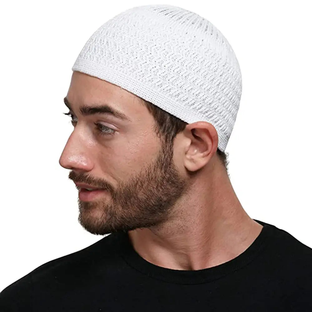 White knitted jacquard winter beanie hat with a textured breathable pattern made of soft yarn
