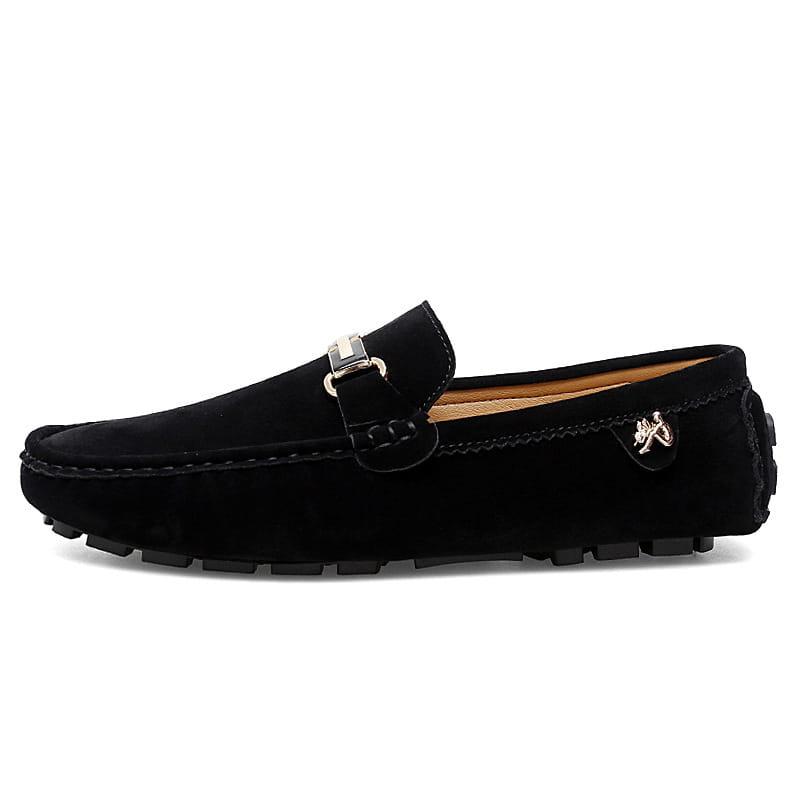 Herren-Slipper aus Samtleder mit Horsebit-Design in Schwarz, mit einer silberfarbenen Schnalle und detaillierten Ziernähten, handgefertigt als Gommino-Schuhen