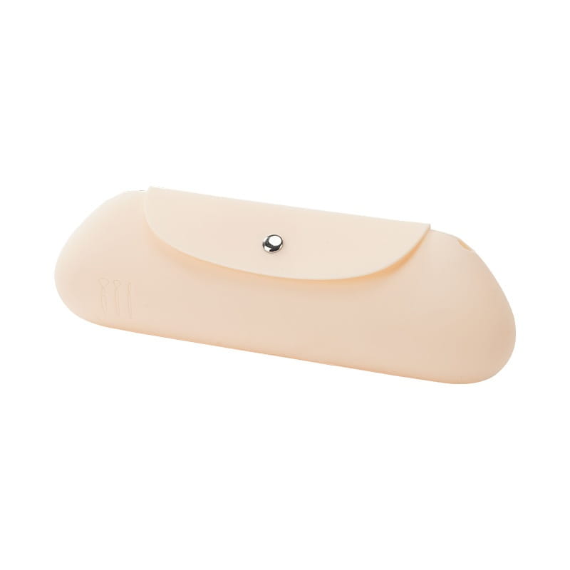 Elfenbeinfarbenes Silikon-Brillenetui mit silberfarbenem Knopfverschluss, gestaltet als Silikon-Make-up-Pinsel-Reisetasche im Pink-Design.