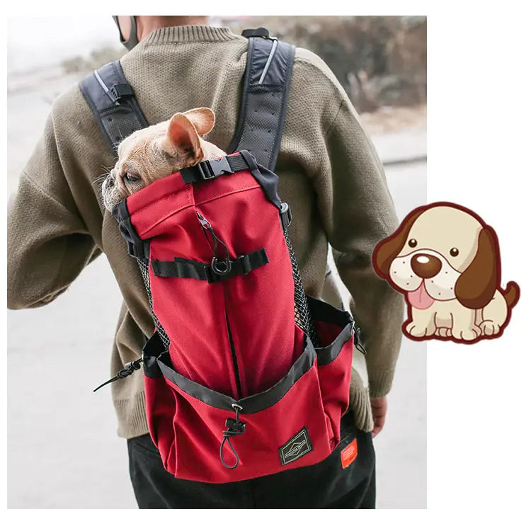 Sac à dos rouge de transport pour chien avec sangles noires et côtés en mesh, conçu comme un sac de voyage en maille portable.