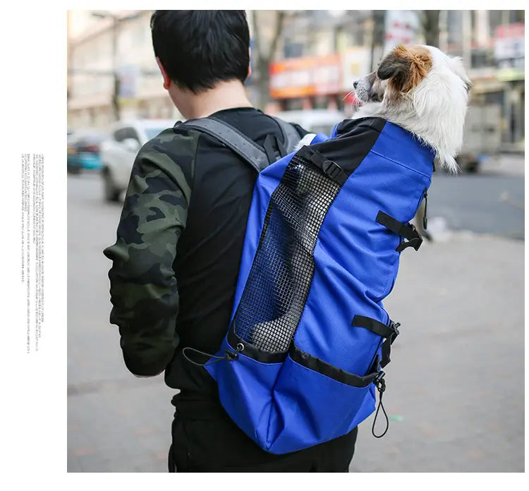 Sac à dos de transport pour chien bleu avec panneau latéral en mesh noir et sangles réglables, pour les déplacements portables.