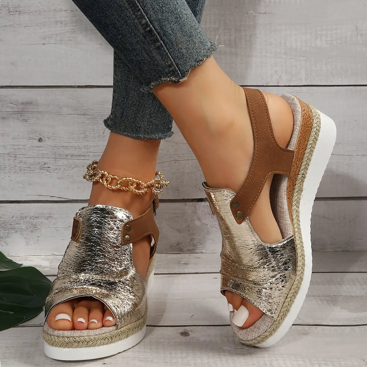 Wedge sandals women peep toe espadrille beach shoes in shiny metallic gold and brown with a woven espadrille sole.