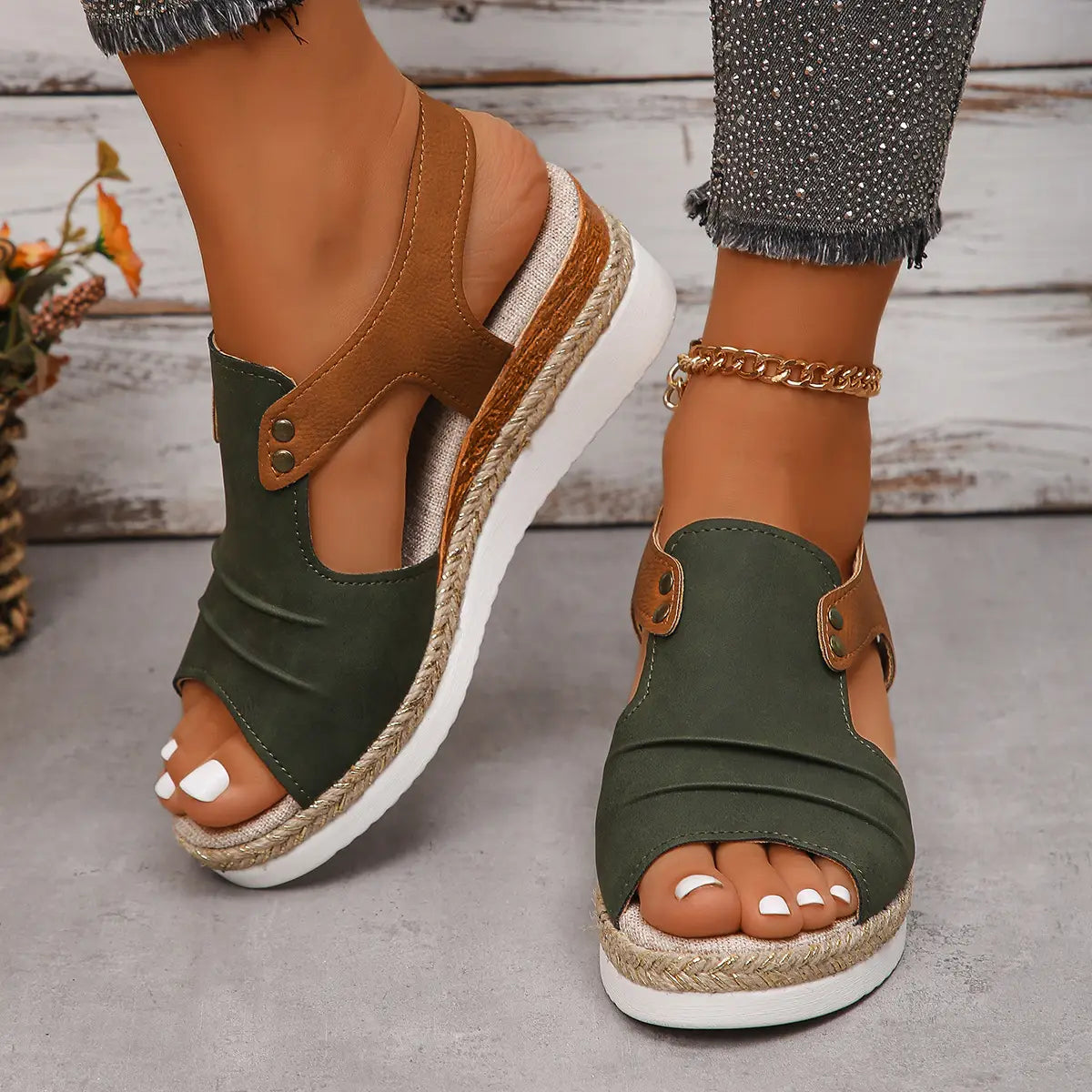 olive green and tan leather wedge sandals with peep toe and braided rope espadrille sole designed for women’s beachwear.