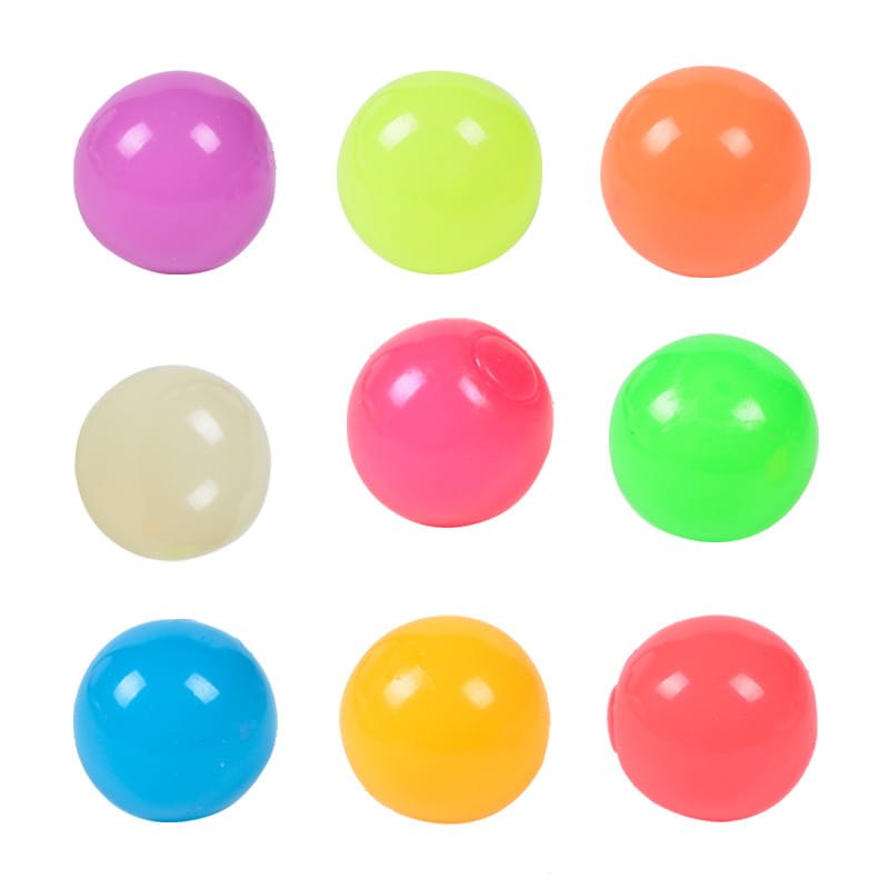 neon-colored luminous sticky wall balls glow in the dark squeeze toy featuring plastic balls in vibrant hues of purple lime green orange pink blue and yellow