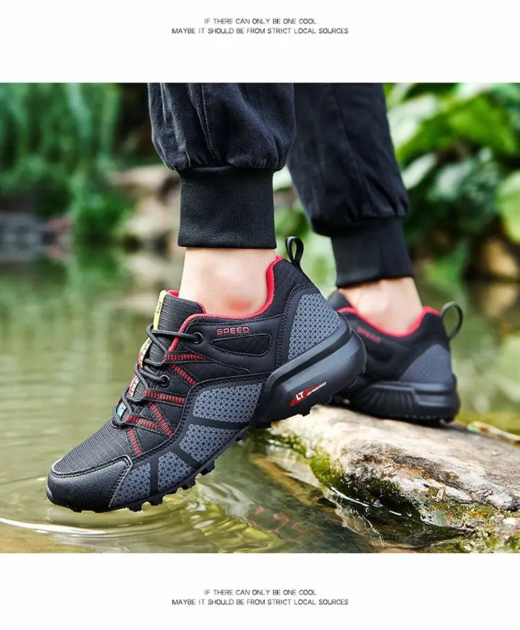 Men’s breathable mesh trail running and hiking shoe in black and red with a mesh upper, rubber outsole, and speed branding on the side.