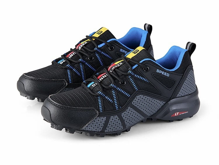 Men’s breathable mesh trail running and hiking shoes in black and blue featuring a textured upper, rubber outsole, and yellow accents on the laces.