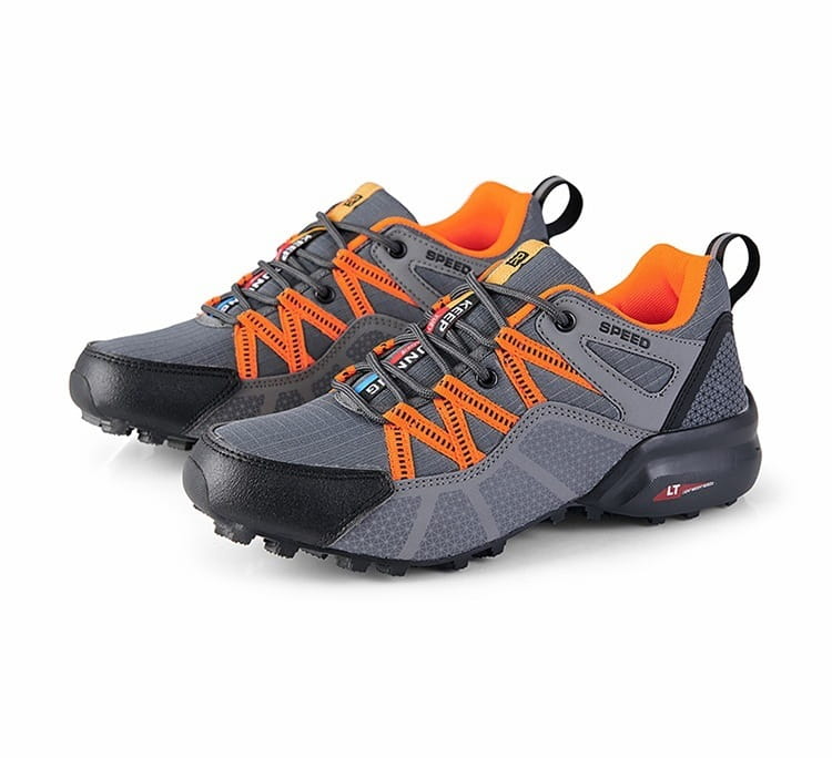Men’s breathable mesh trail running and hiking shoes in gray and orange with black rubber soles and mesh uppers.