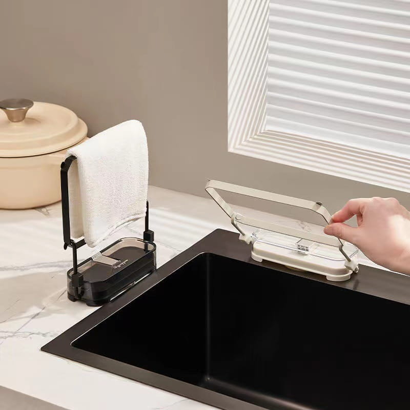 black and transparent plastic kitchen sink filter rack with mesh strainer bags and towel rack attachment designed for organized dishwashing and drying.