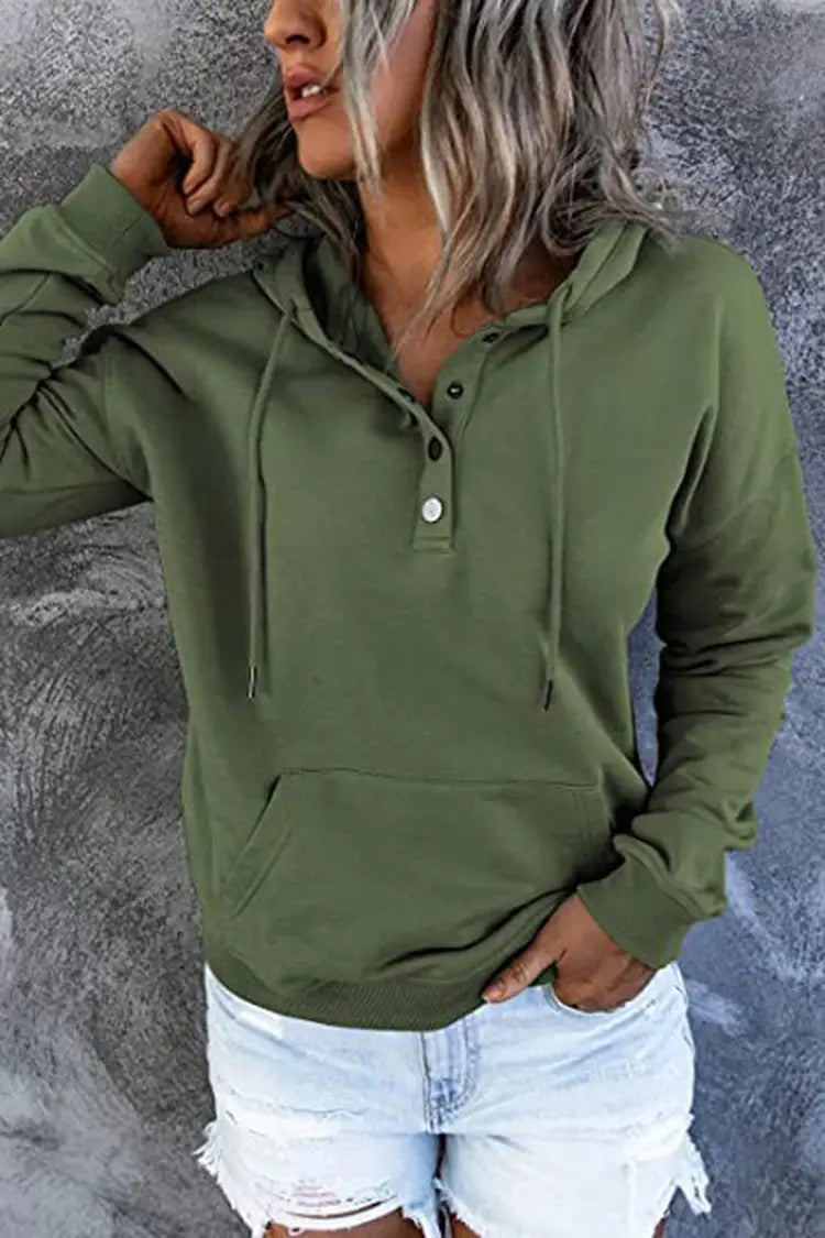 Olive green women’s button neck drawstring hooded sweatshirt featuring a long-sleeved hoodie with a buttoned placket and front pocket.