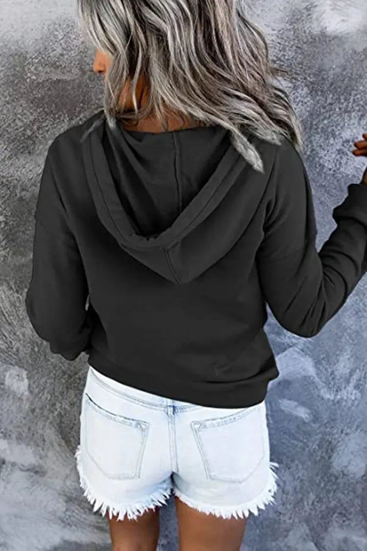 Black women’s button neck drawstring hooded sweatshirt with long sleeves ribbed cuffs and a relaxed fit.