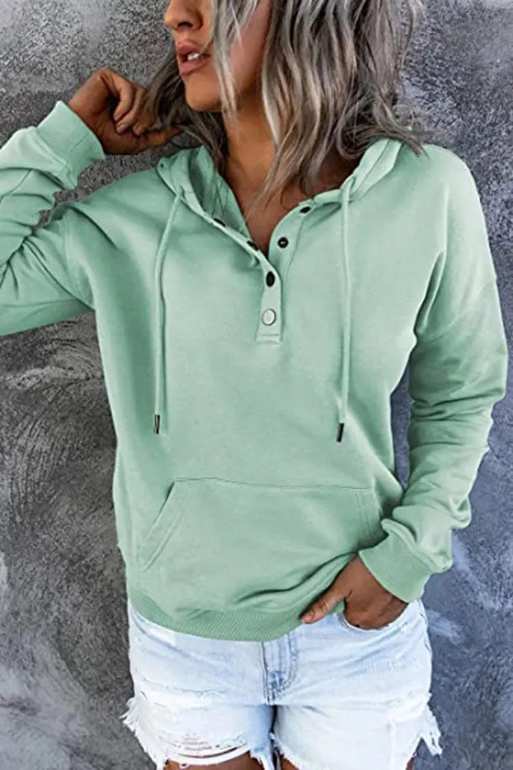 Women’s soft mint green hooded sweatshirt with button-front neckline, front pocket, and drawstring for casual wear.