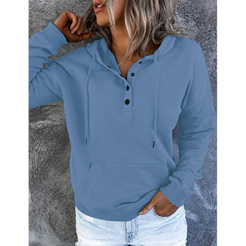Women’s button neck drawstring hooded sweatshirt in light blue with long sleeves, black button accents, and a front pocket.