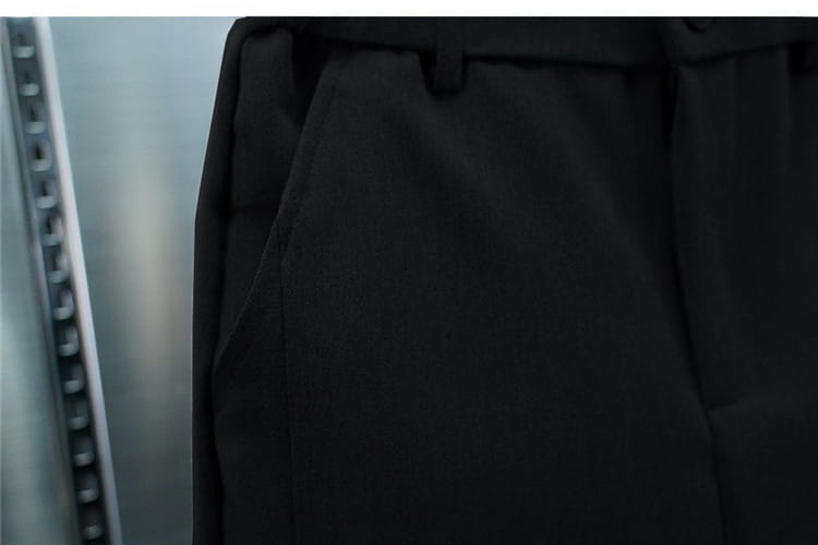 black men’s casual tapered jogger pants with smooth tailored fabric and visible belt loops