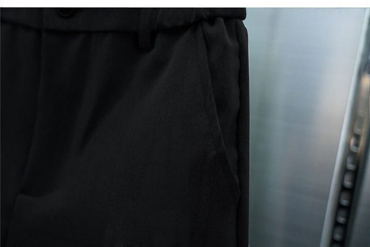 men’s casual tapered jogger pants in black with a soft slightly textured fabric and drawstring waistband