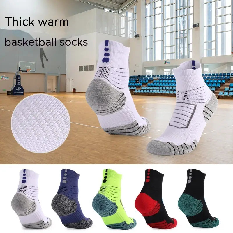 Athletic knee high sports socks in white and gray with reinforced cushioning breathable mesh texture and bold blue accent dots on the ankle.
