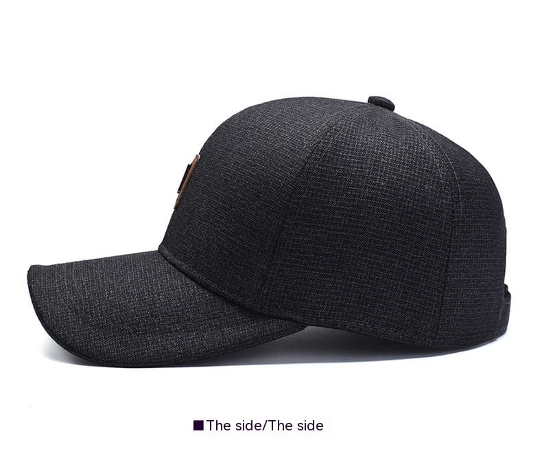 Black textured cotton baseball cap featuring a small brown leather patch on the side