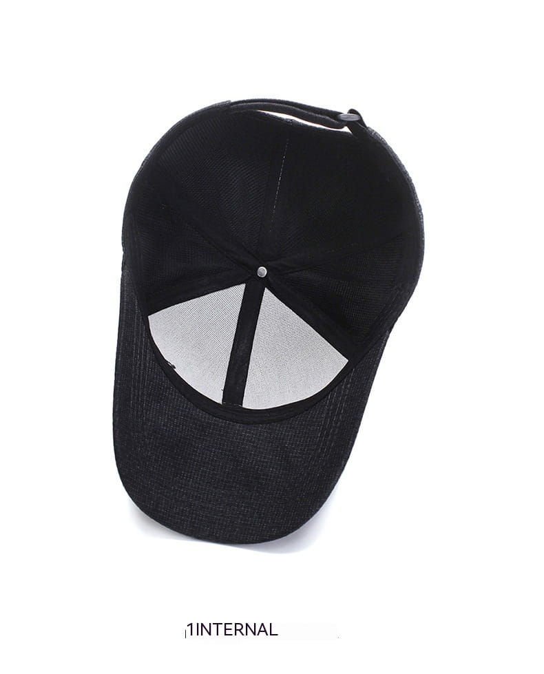 black textured cotton baseball cap with leather patch showing the back side with mesh back panel and adjustable strap