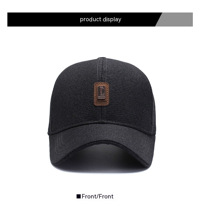 Black textured cotton baseball cap featuring a brown leather patch on the front.
