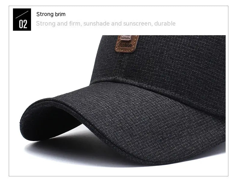 Black textured cotton baseball cap with a brown leather patch on the front.