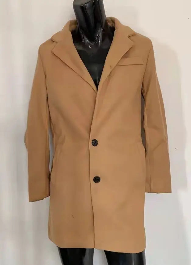 Mens double sided woolen overcoat in tan wool with black buttons displayed on a mannequin.