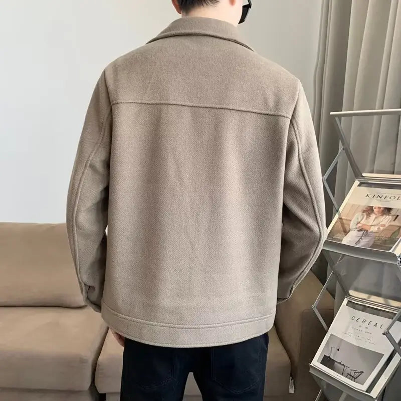 Beige wool-blend men woolen coat with a classic collar and button closure designed as a casual jacket with a clean minimalist design.