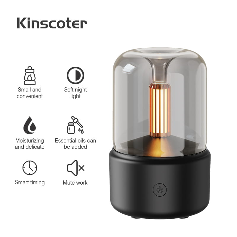 Kinscoter candle light aroma diffuser usb humidifier with a sleek black base and transparent glass dome featuring an illuminated copper-colored vertical element and 120ml capacity.