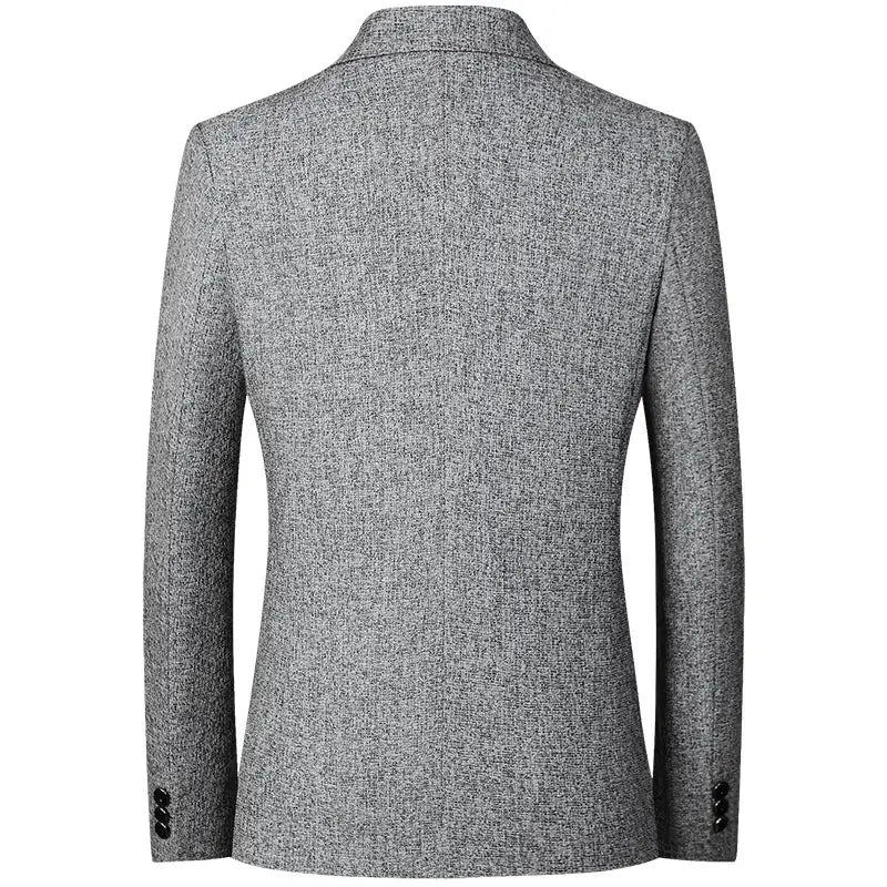 A tailored gray tweed blazer with a subtle textured weave and notched lapel designed as a men’s casual thin blazer spring jacket.