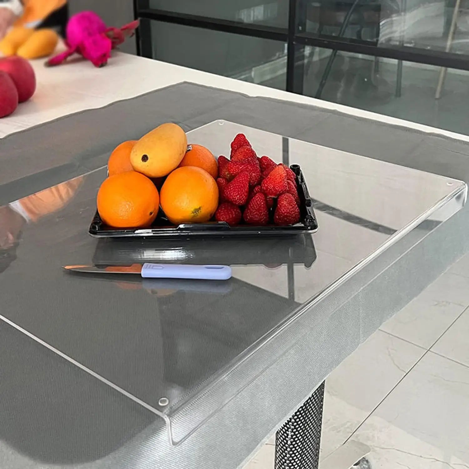 Clear acrylic table protector with non slip feature transparent design and rounded corners ideal as an acrylic cutting board kitchen mat.
