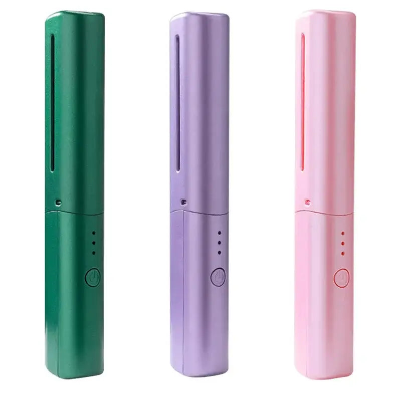 Three slim cylindrical wireless hair straightener brushes in green lavender and pink with metallic ceramic finishes for portable use.