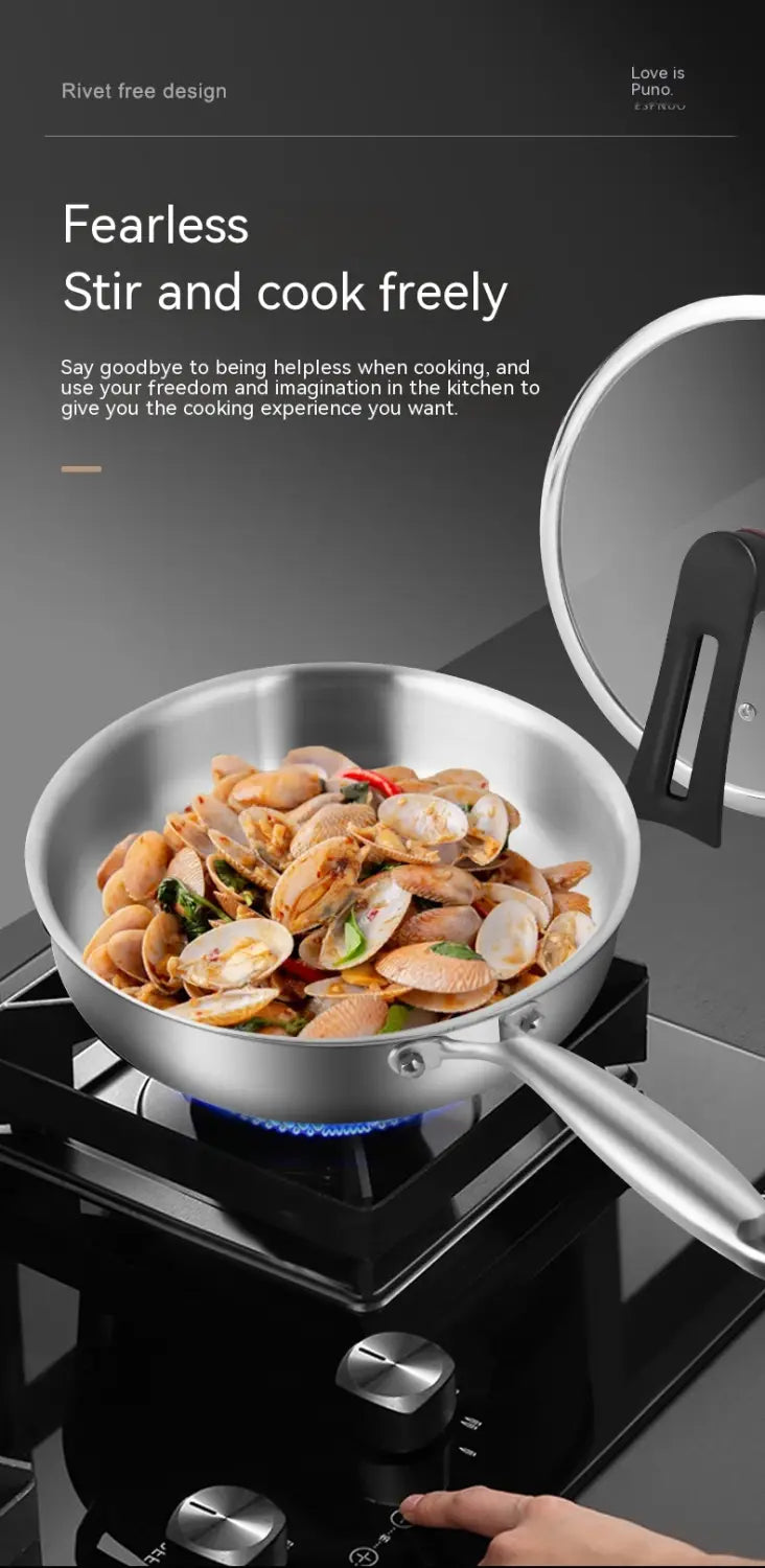 Sartén de acero inoxidable 316L con tapa de vidrio, con un diseño elegante sin remaches y un mango resistente en color plateado.