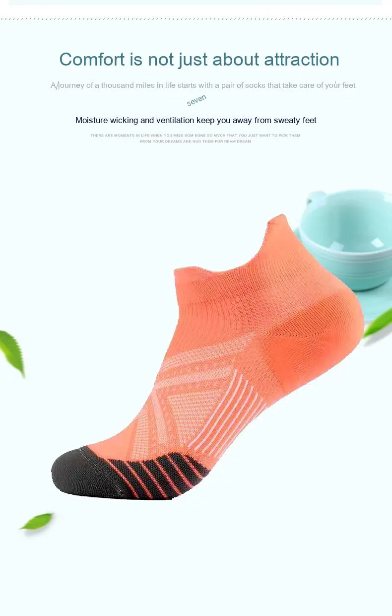 A vibrant orange compression athletic sock with black toe and heel made of nylon featuring a breathable mesh design for moisture-wicking performance ideal for soccer footwear.