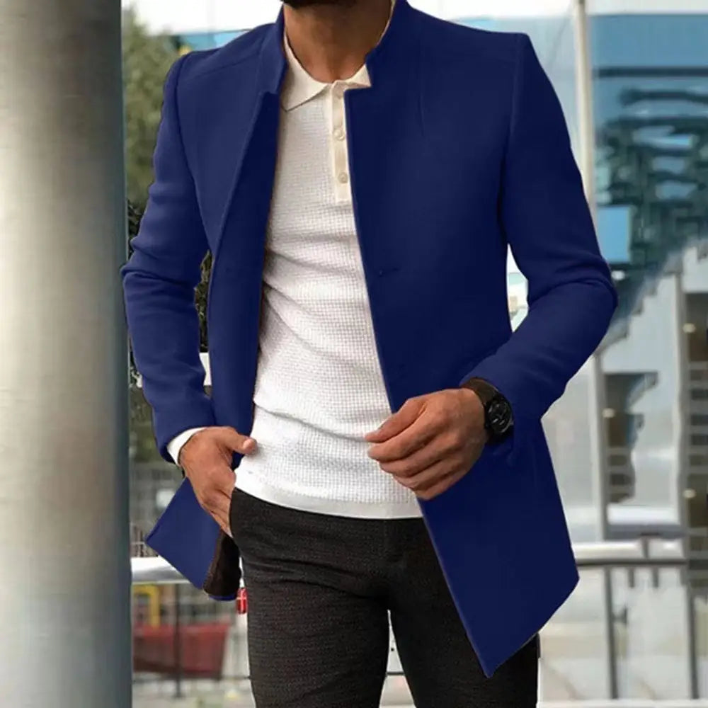 A vibrant royal blue mens slim fit solid color overcoat with a tailored modern cut and subtle texture.