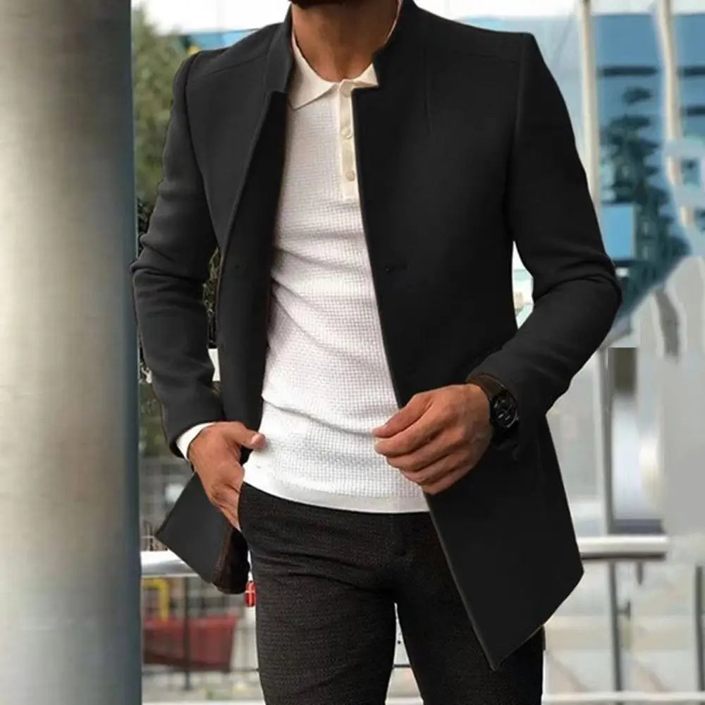 Mens slim fit solid color overcoat in black tailored fabric with a structured fit and notched lapels.