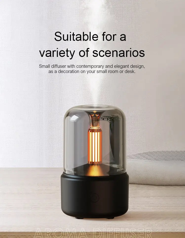 Black cylindrical candlelight aroma diffuser usb mist humidifier with a transparent glass dome housing an illuminated golden vertical element and 120ml capacity.