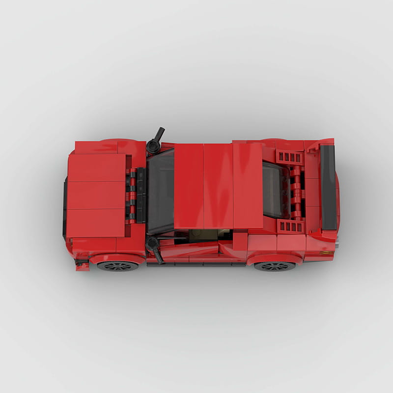 Rotes Sportwagen-Bausteinset M10386 mit einem roten LEGO-Modell eines Sportwagens mit schwarzen Fenstern und Rädern