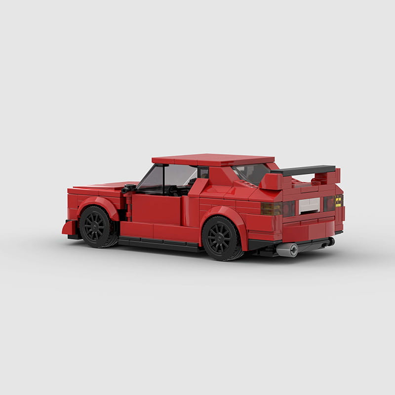 Rotes Sportwagen-Bausteinset M10386 mit einem LEGO-basierten Modell mit schwarzen Rädern und einem hinteren Spoiler.