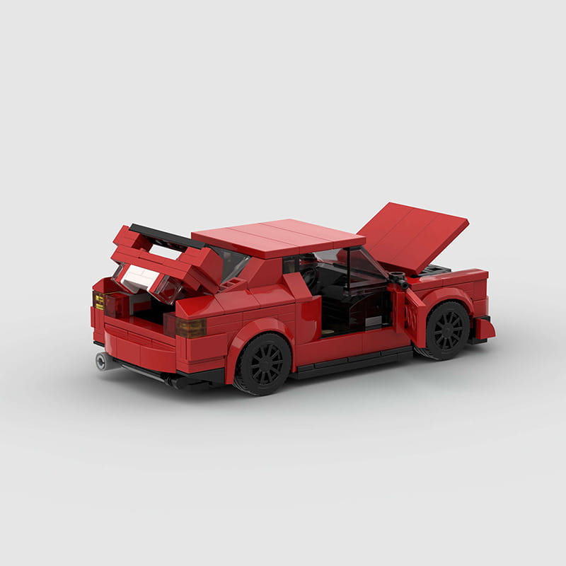 Modell des roten Sportwagen-Bausteinsets M10386 aus LEGO TECHNIC mit offenen Türen und Kofferraum, schwarzen Rädern und detailliertem Innenraum.